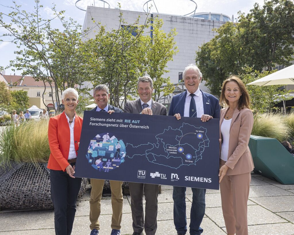 Gruppenfoto anlässlich des Ausweitung der Forschungskooperation von Siemens mit Universitäten