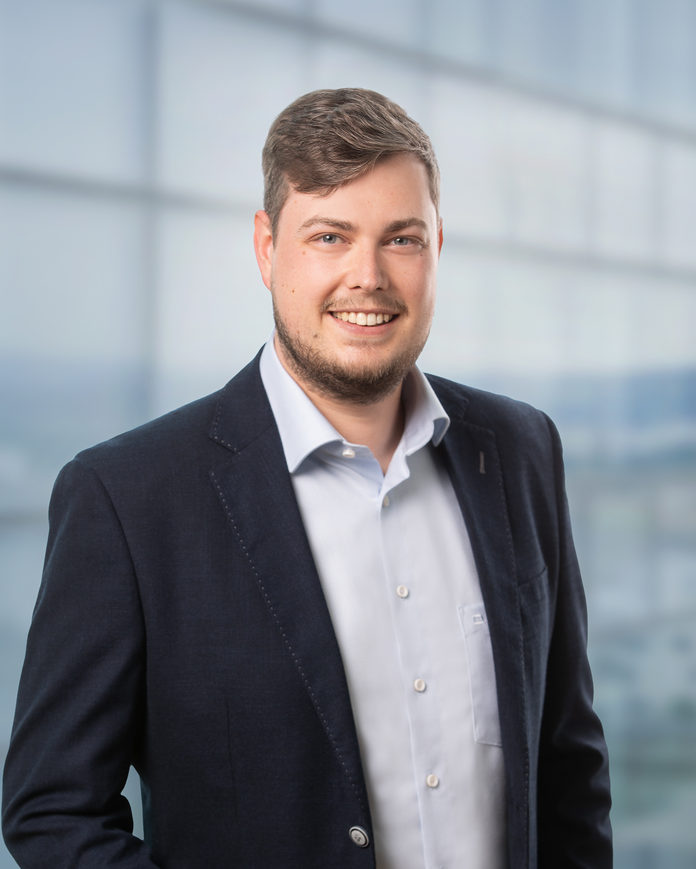 Business Portrait Warren Purcell, AI Architect und Researcher im Bereich Distributed Al Systems